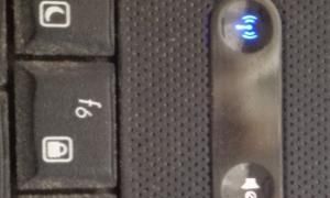 如何打开HP笔记本的无线网络开关，老式惠普笔记本电脑无线网卡开关在哪？图1