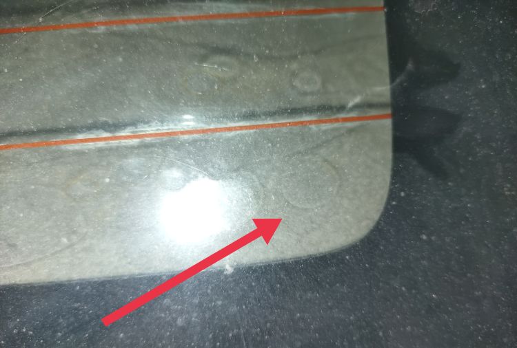 如何去除贴膜中的气泡，汽车贴膜后有小气泡怎么办？图2